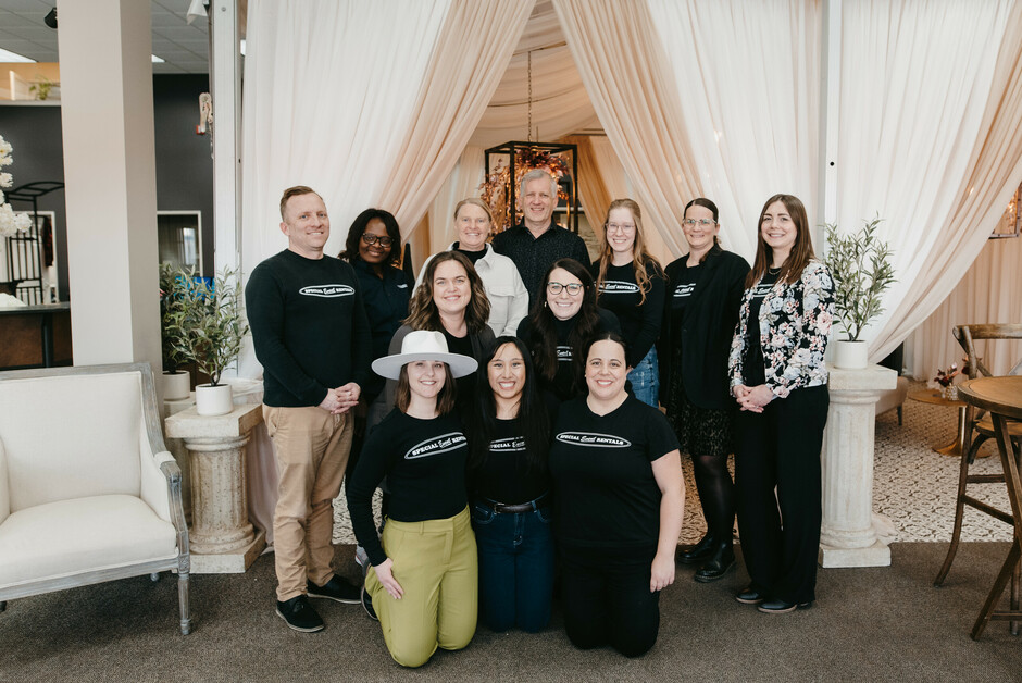 Division of Special Event Rentals group in Edmonton - Special Event Rentals showing staff in front of tent inside the store