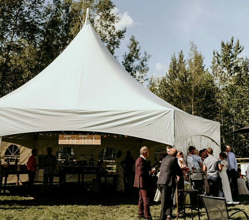 Tent Rentals Edmonton showing a white frame tent as a tea tent for guest for a wedding